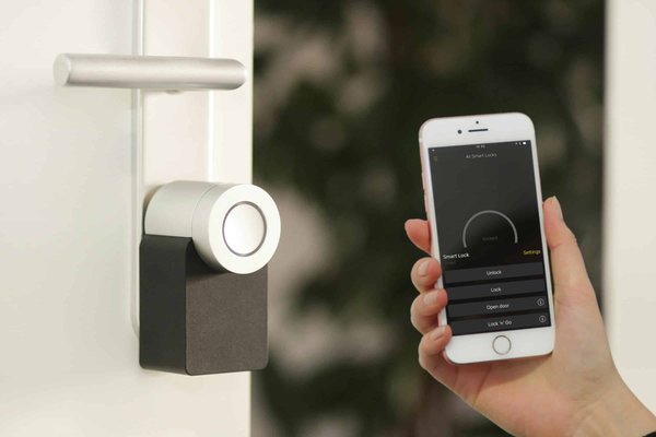 How Can You Use Your Smartphone to Control and Monitor a Smart Door Lock System?